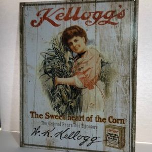 Kelloggs metal wall art with a girl holding corn